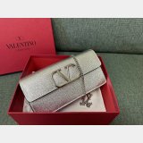 Valentino Garavani V Logo Signature Grained Calfskin Clutch