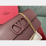 Valentino Garavani V Logo Signature Grained Calfskin Clutch